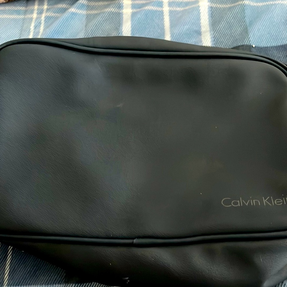 Men’s Calvin Klein Toiletry Bag with zipper. Navy blue. Approximately 10” length